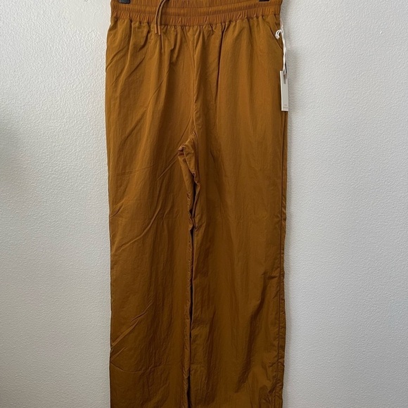NWT Good American Bronze Gold Wide Leg Track Pants Size 1/Small Elastic Waist - Picture 2 of 8
